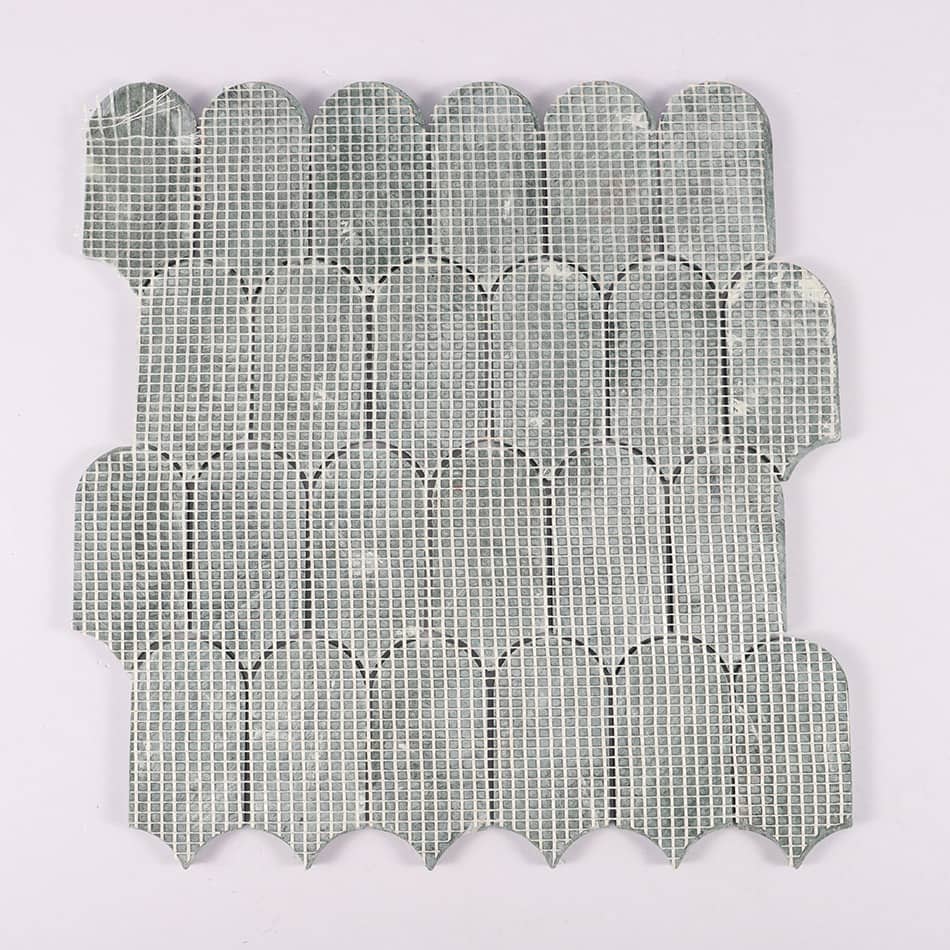 Back view of dark green marble scallop mosaic tile with mesh backing