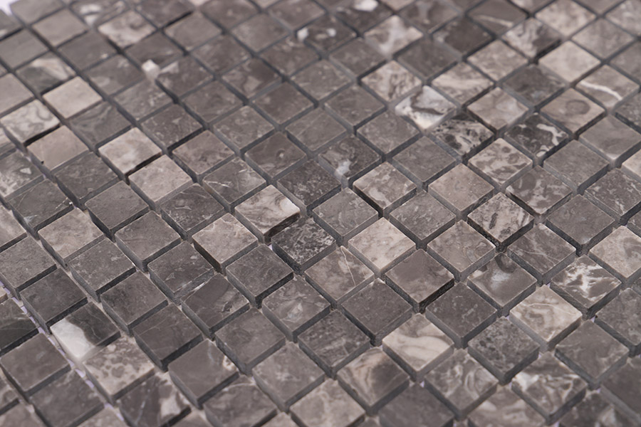 {"default":"Dark marble mosaic tiles in a small square pattern with grey stone veining"}
