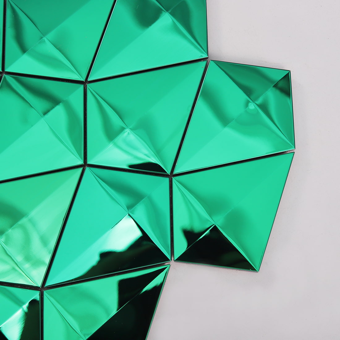 Corner detail of emerald green diamond mirror mosaic tile