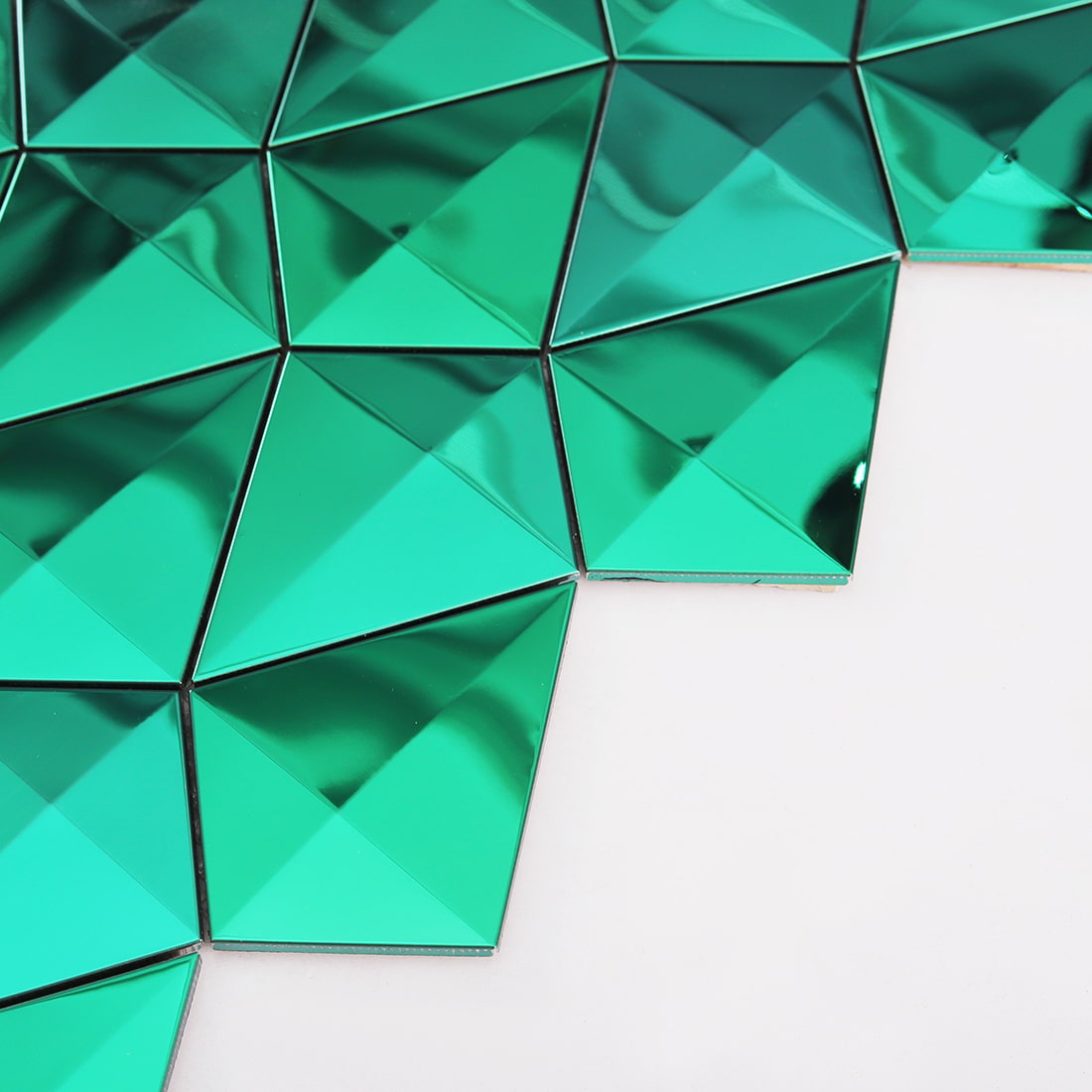 Edge close up of emerald green diamond mirror mosaic tile