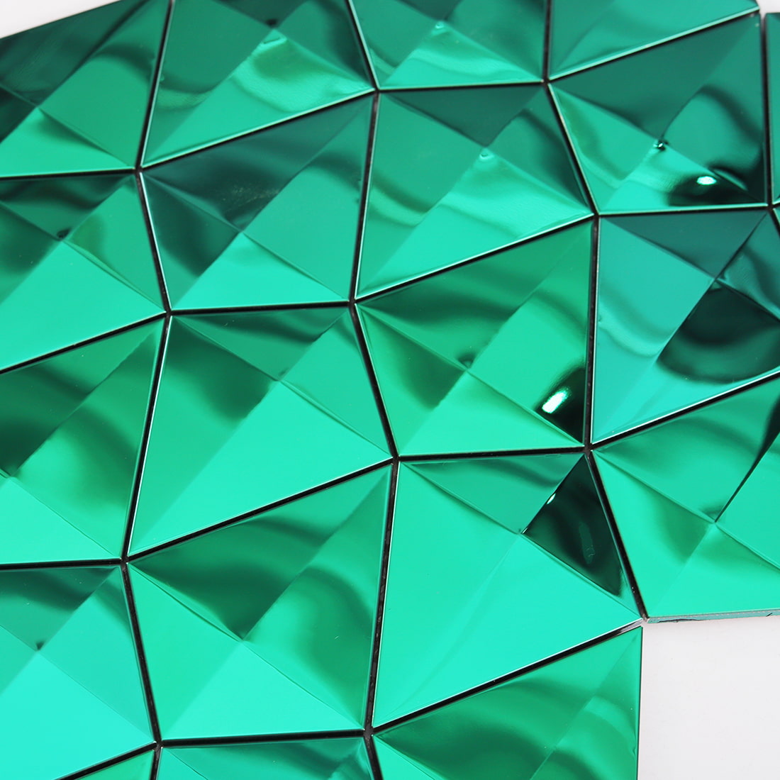 Close up of emerald green diamond mirror mosaic tile surface