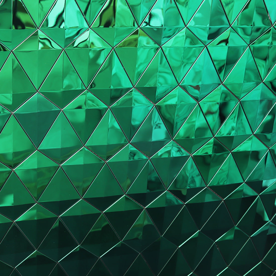 Emerald green diamond mirror mosaic wall close up texture