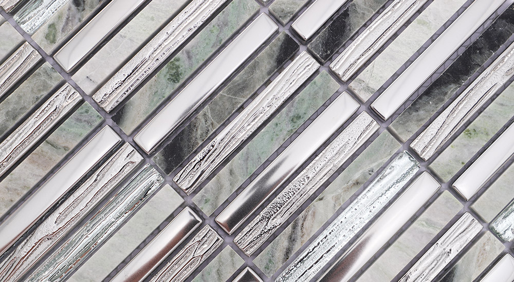 {"default":"Finger Tiles featuring green marble and textured silver metallic strips for luxury walls."}
