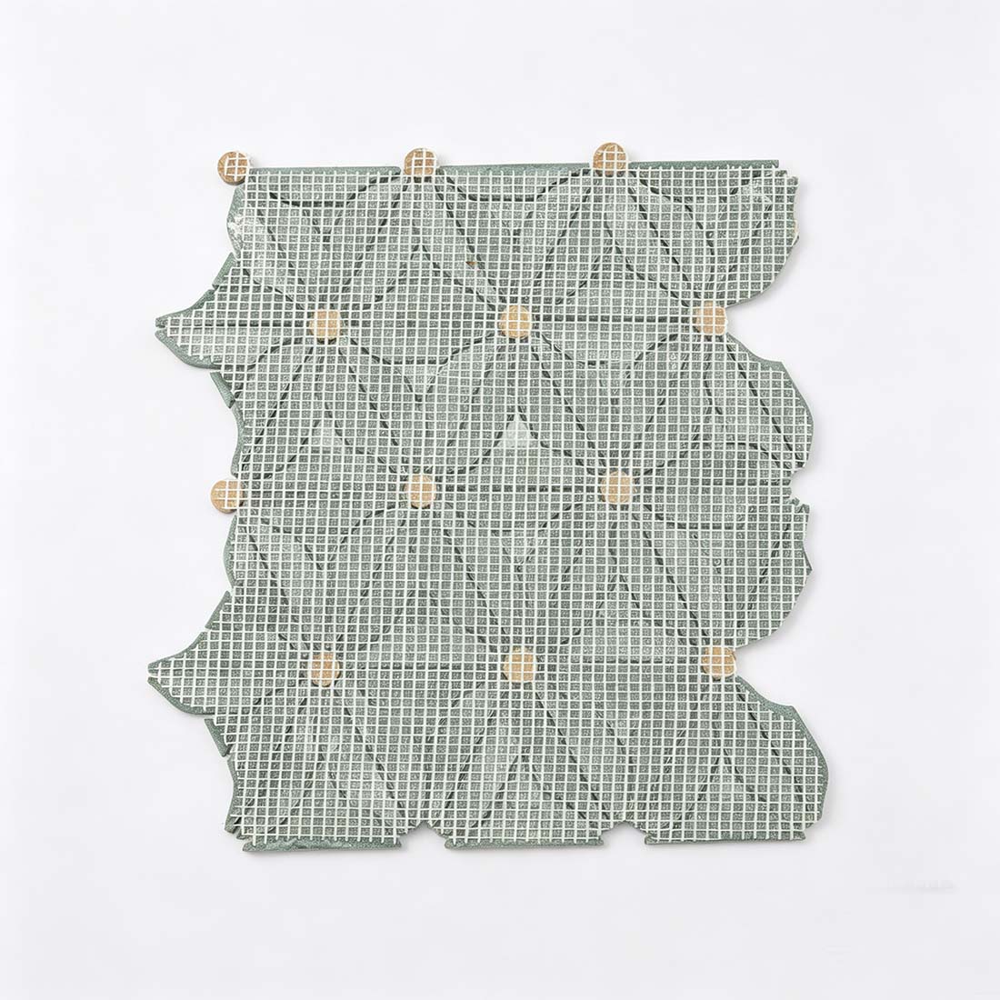 Back view of forest green floral marble mosaic tile with mesh backing