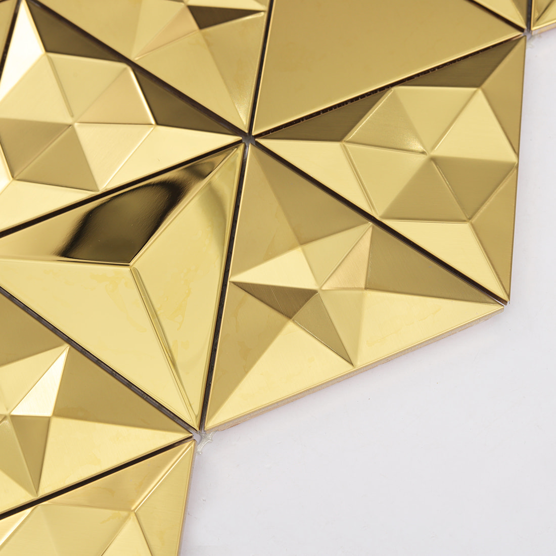 Glossy gold 3D triangle mosaic tile with geometric raised pattern