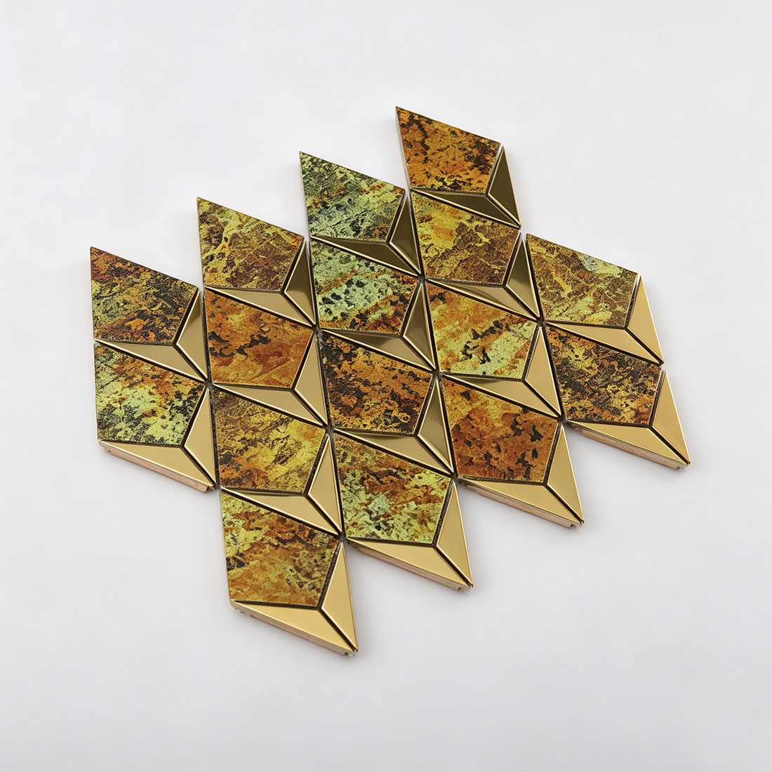 Perspective view of gold antique aluminum mosaic tiles with a faceted kite pattern