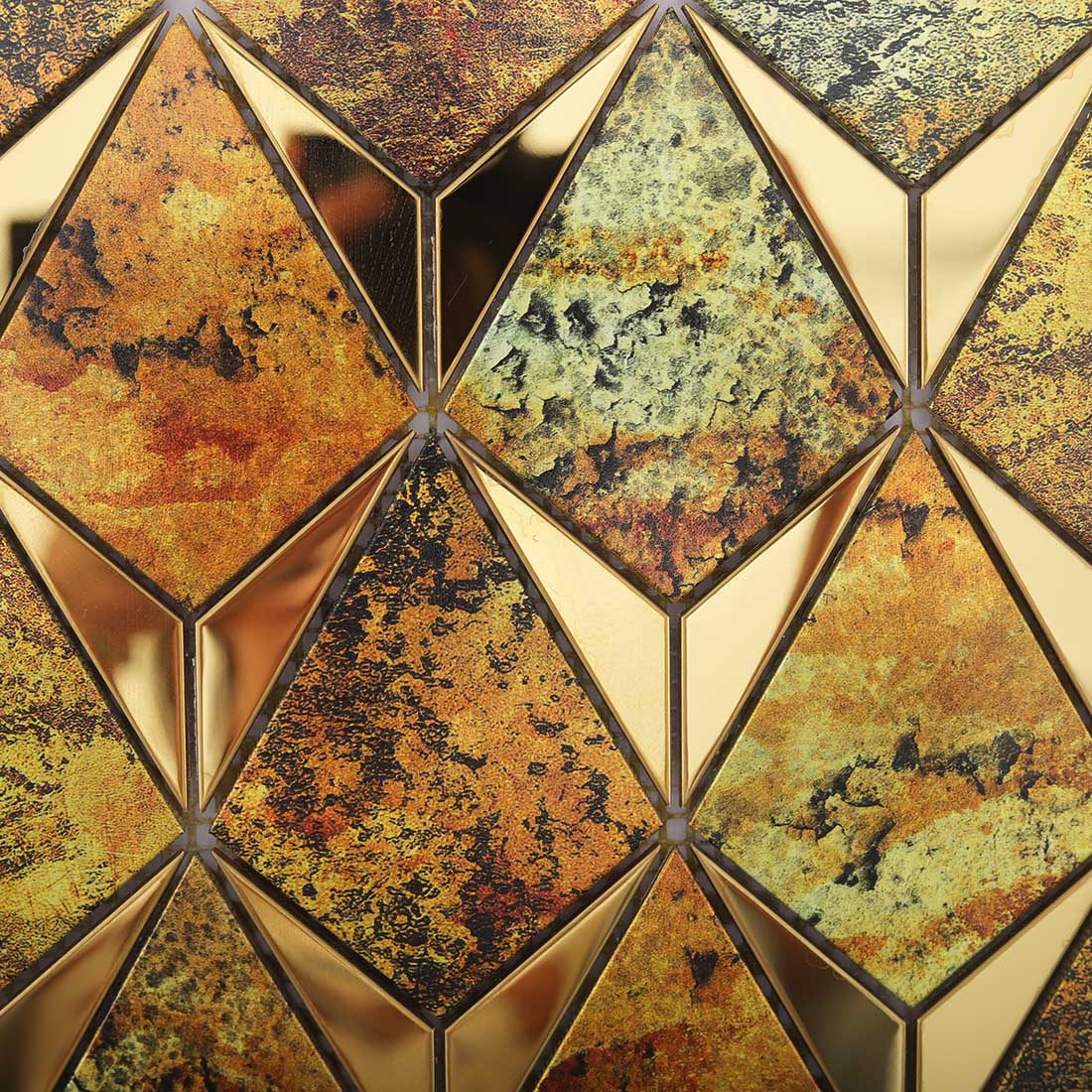 Detailed view of gold antique aluminum mosaic tiles with polished steel accents