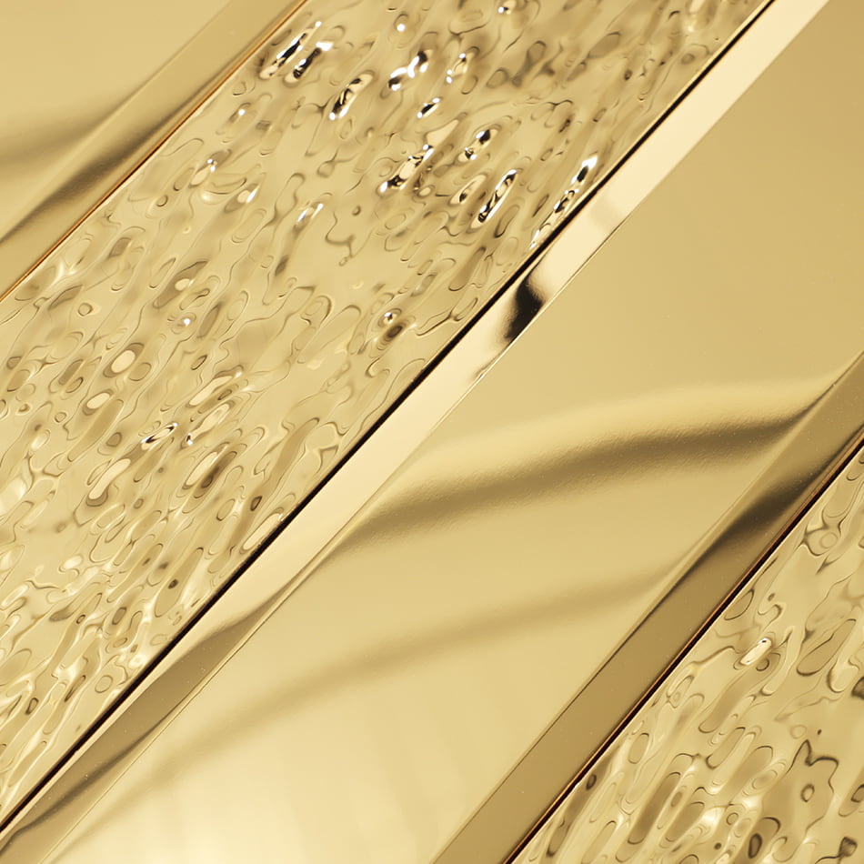 Close view of gold beveled and textured metal tile surface