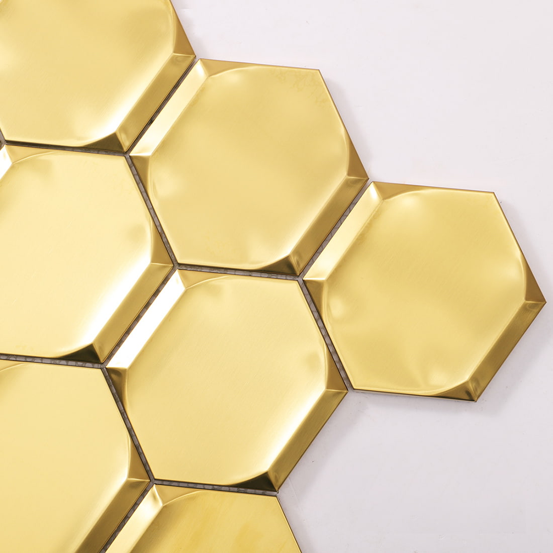 Corner detail of gold brushed 3D hexagon stainless steel mosaic tile