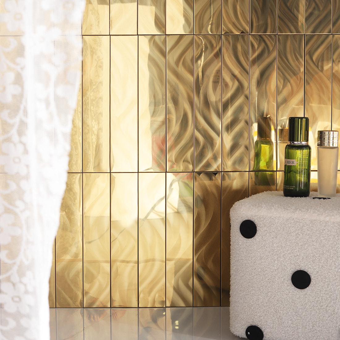 Gold brushed metal mosaic bathroom wall scene with vanity decor