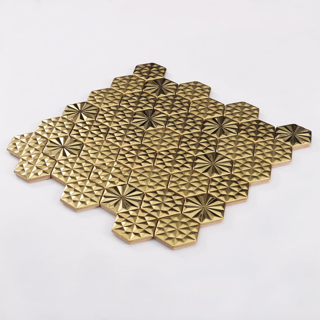 Perspective view of gold embossed hexagon metal mosaic tile sheet