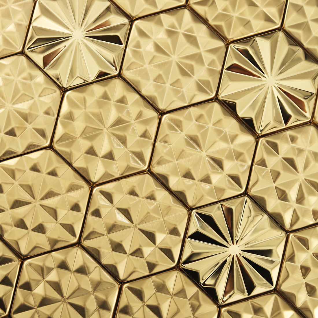 Close-up of gold embossed hexagon metal mosaic tile surface