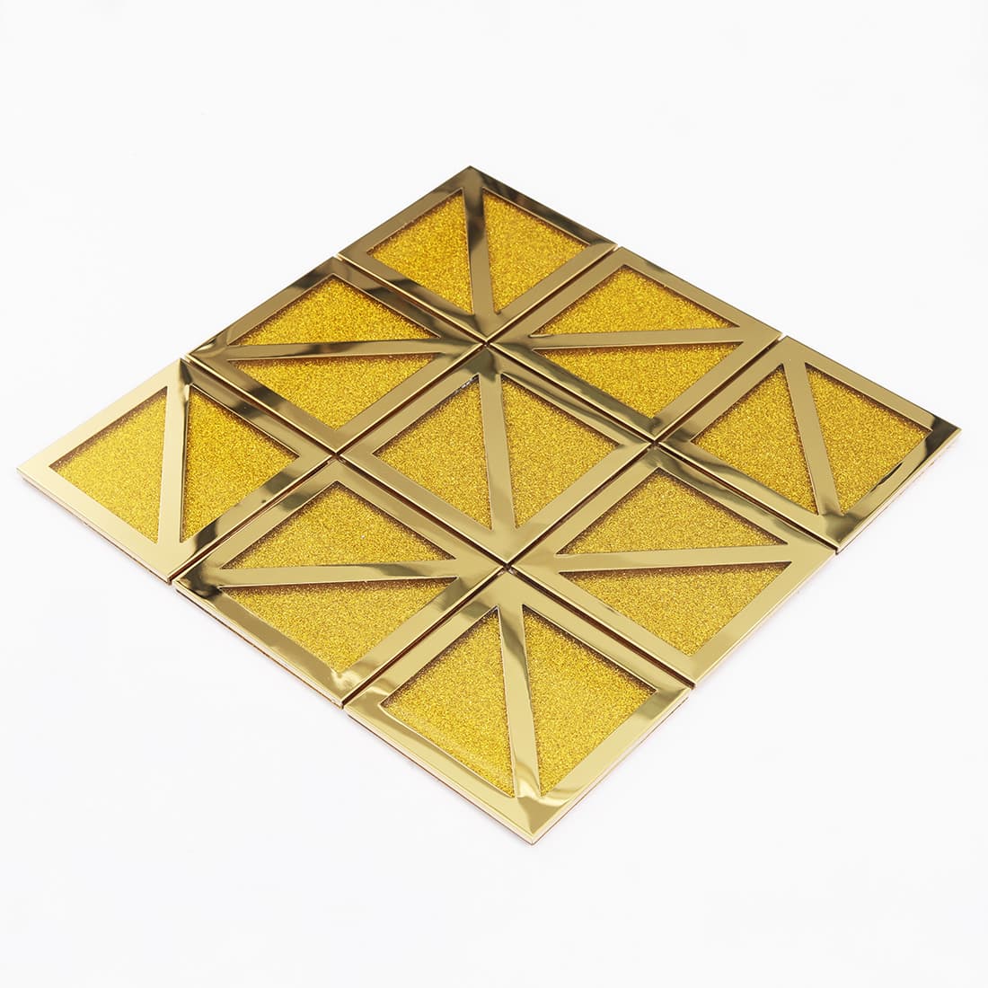 Angled view of gold framed square mosaic tiles with sparkling geometric centers
