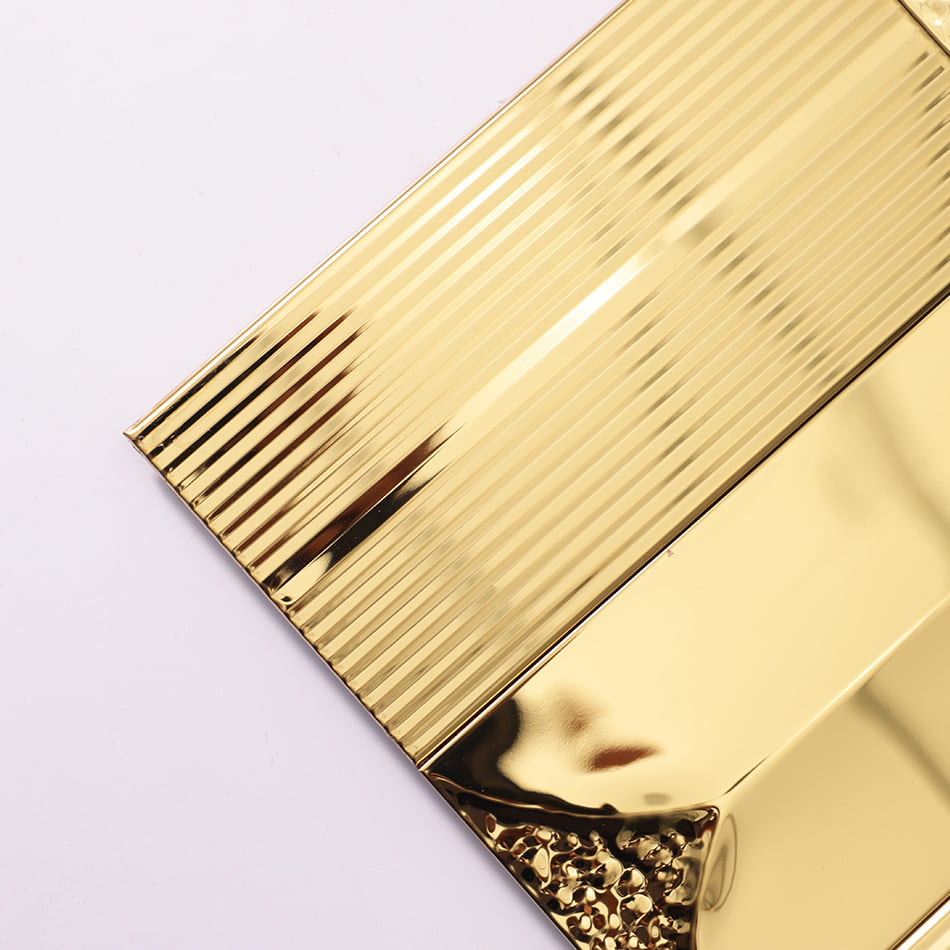 Corner detail of gold glossy textured rectangular metal mosaic tile