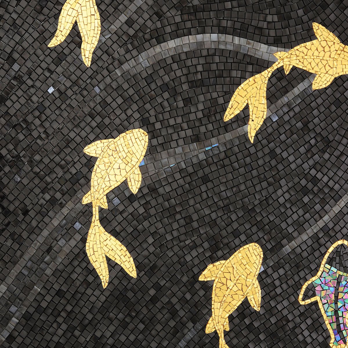 Golden koi fish mosaic swimming on black tiled background with silver wave lines
