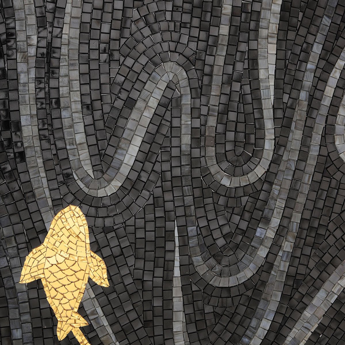 Golden koi fish mosaic with black and silver wave tile pattern