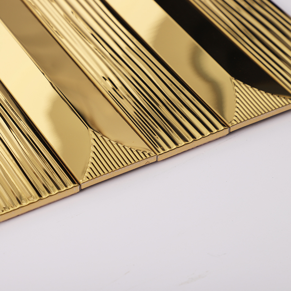 Edge and thickness detail of gold linear stainless steel tile