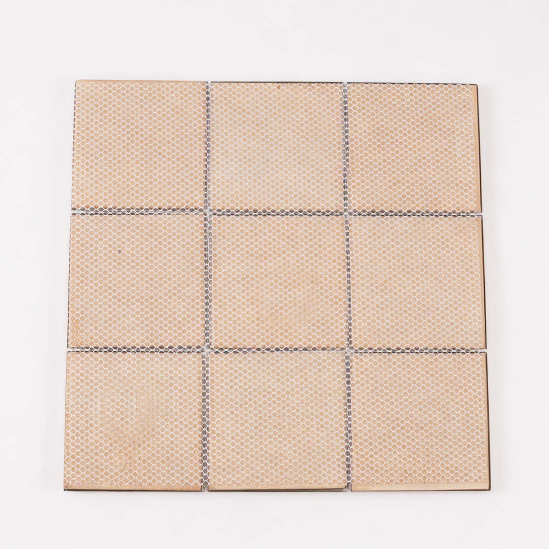 Back view of mesh mounted gold pyramid square metal mosaic sheet