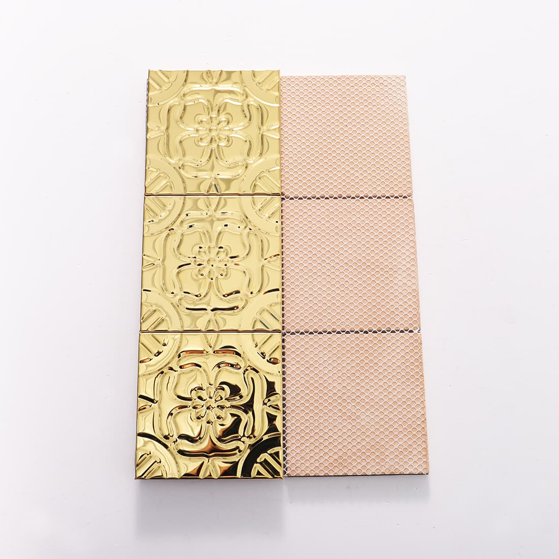 Front and mesh back view of gold stainless steel embossed floral tiles