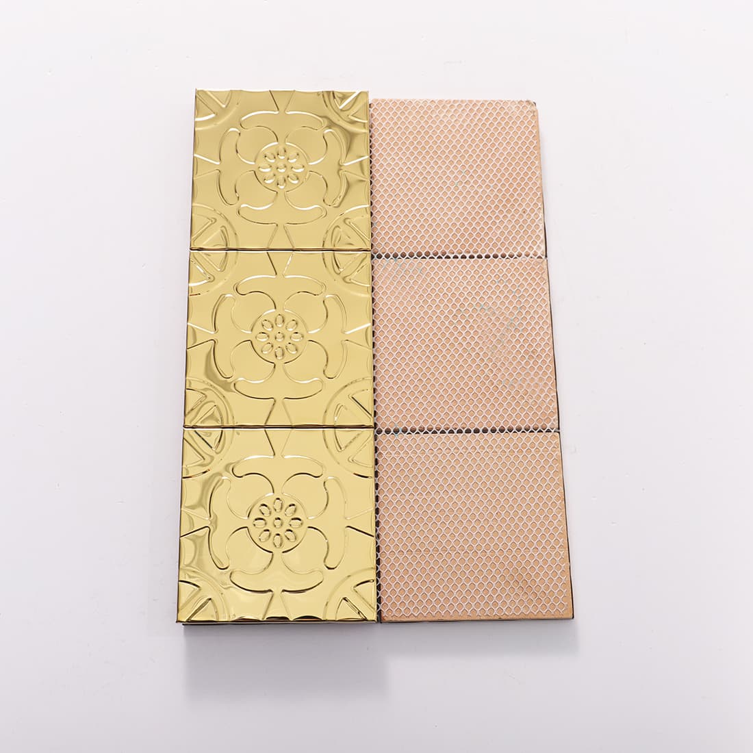 Front and mesh back view of gold stainless steel floral embossed tiles