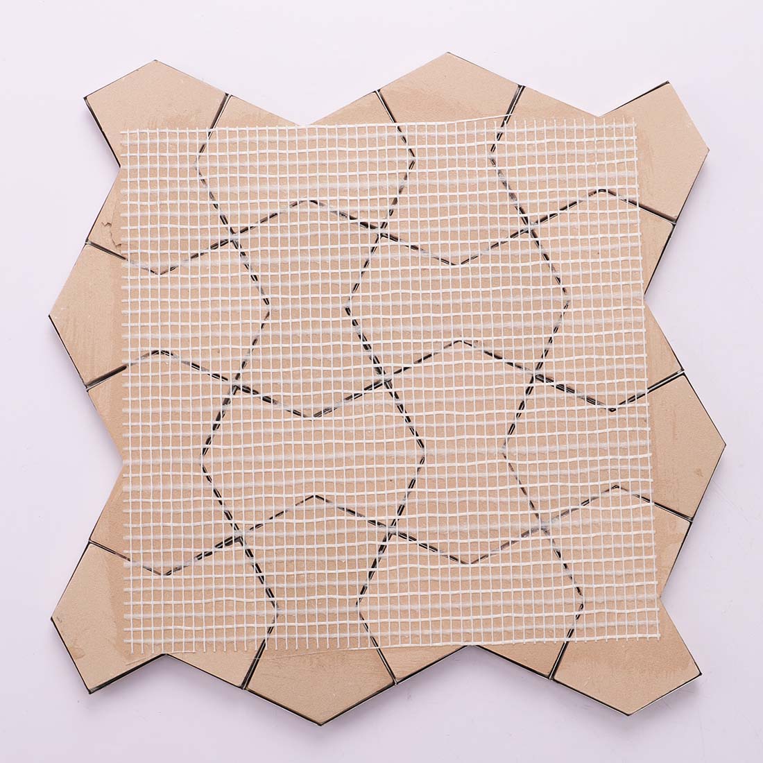 Back view of gold star geometric metal mosaic tile sheet with mesh backing