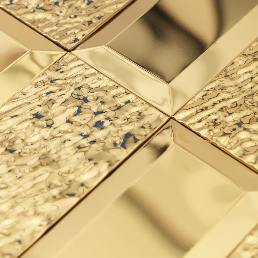 Close-up of gold textured rectangular metal mosaic tile pattern
