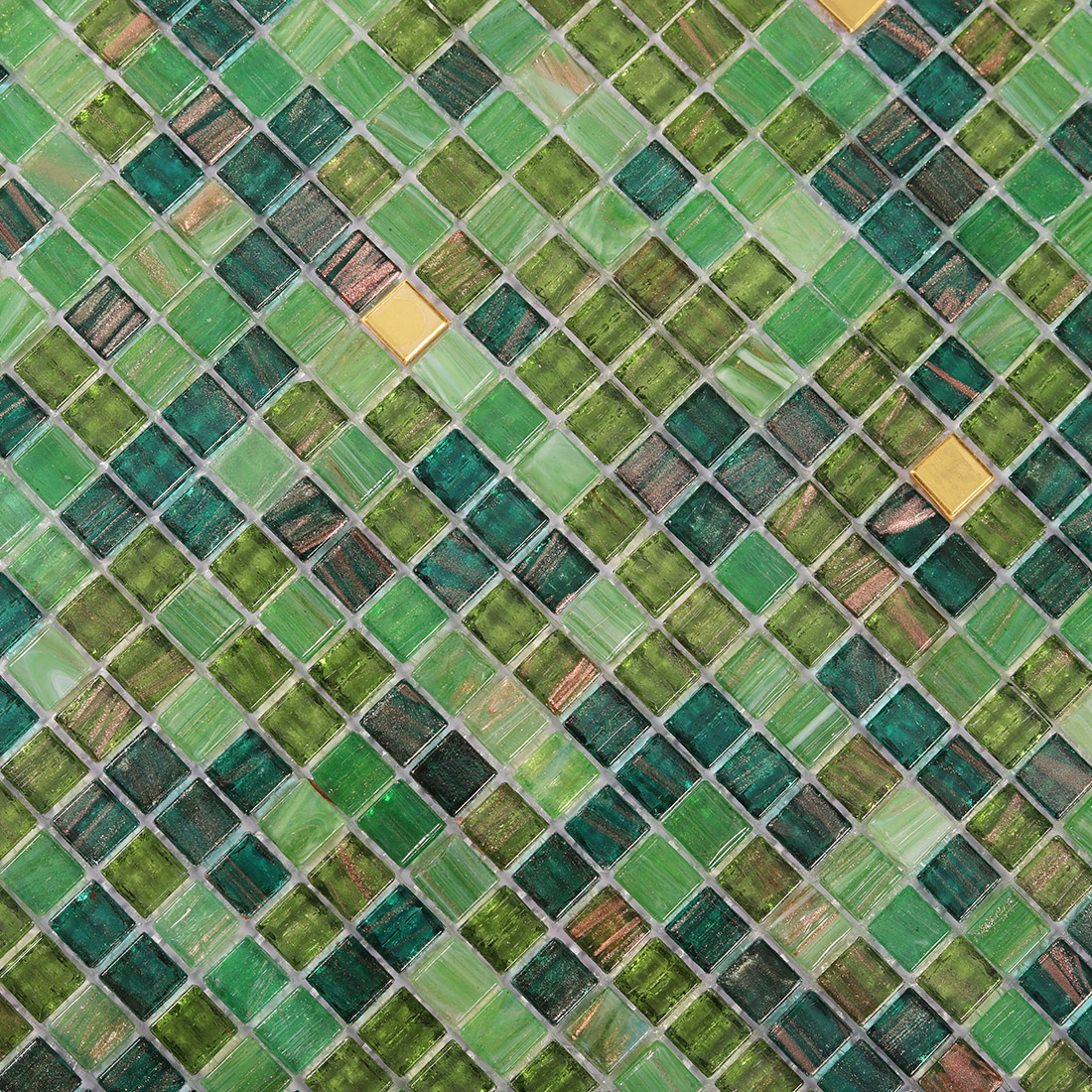 High angle texture view of green glass mosaic tile with metallic gold accents