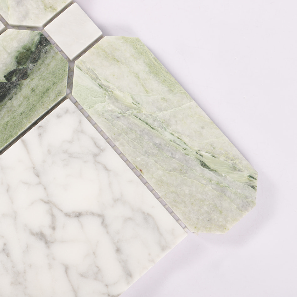 Corner detail of green marble and white marble mosaic tile pattern