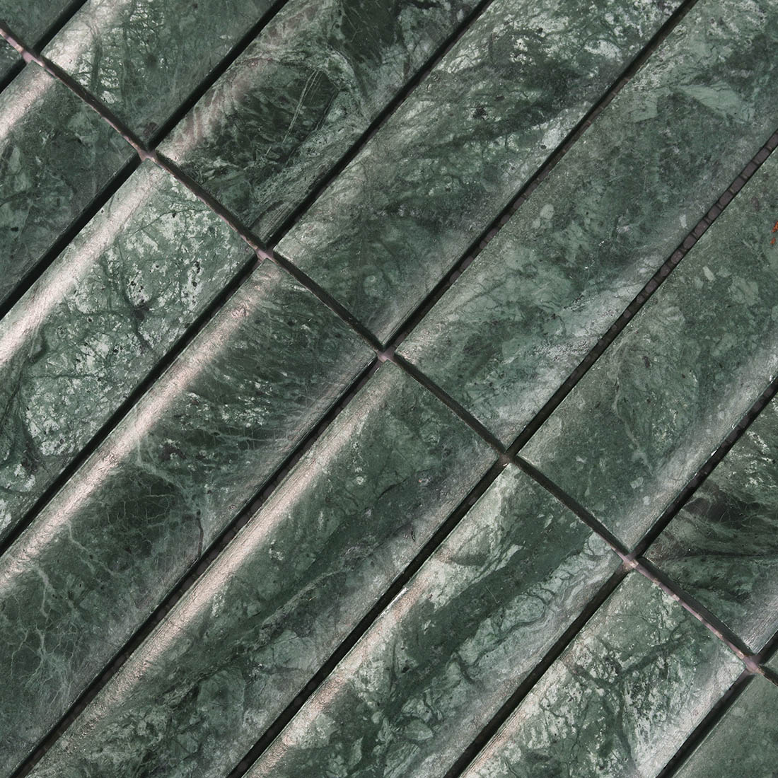 Green marble dimensional liner tile texture detail with dark stone veins
