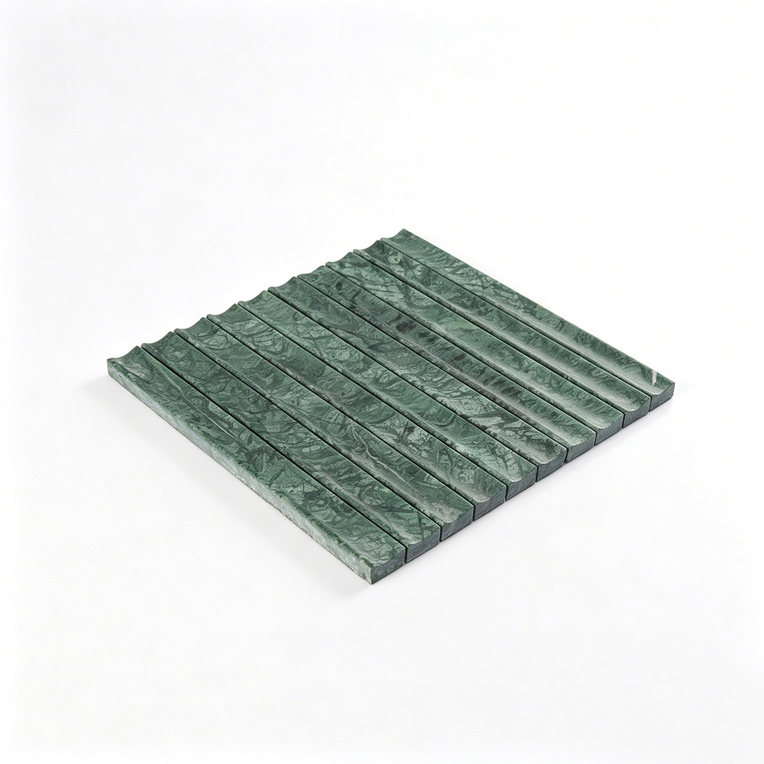 Angled perspective of luxurious fluted emerald green marble wall tile.