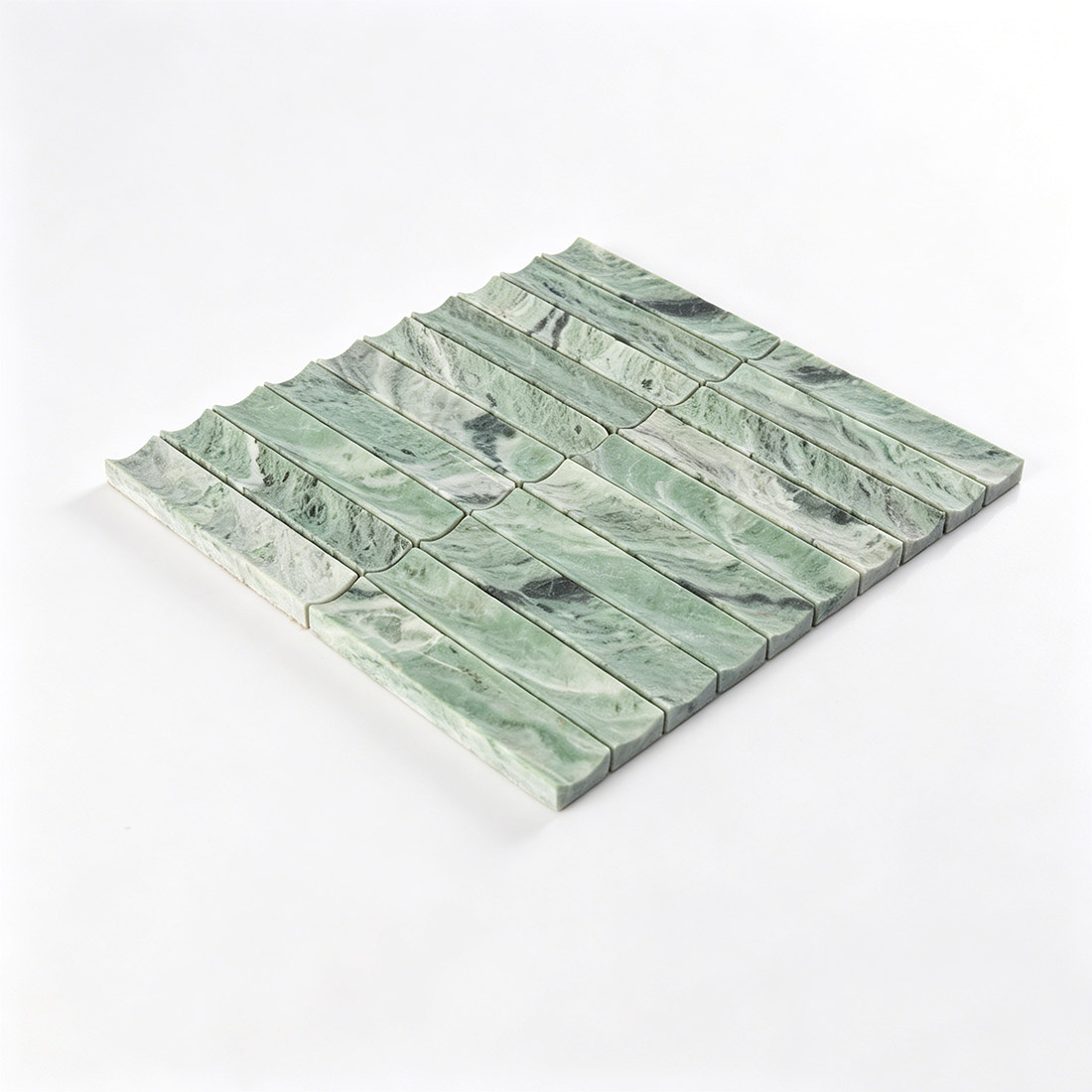 Angled view of green marble fluted stacked mosaic.