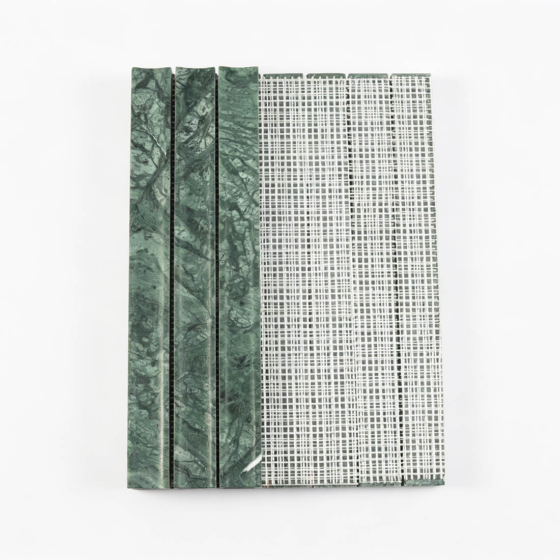 Professional mesh-mounted backing of emerald green marble fluted mosaic tile.