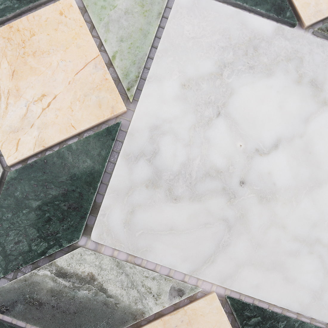 Detailed view of green beige and white marble octagon mosaic pattern