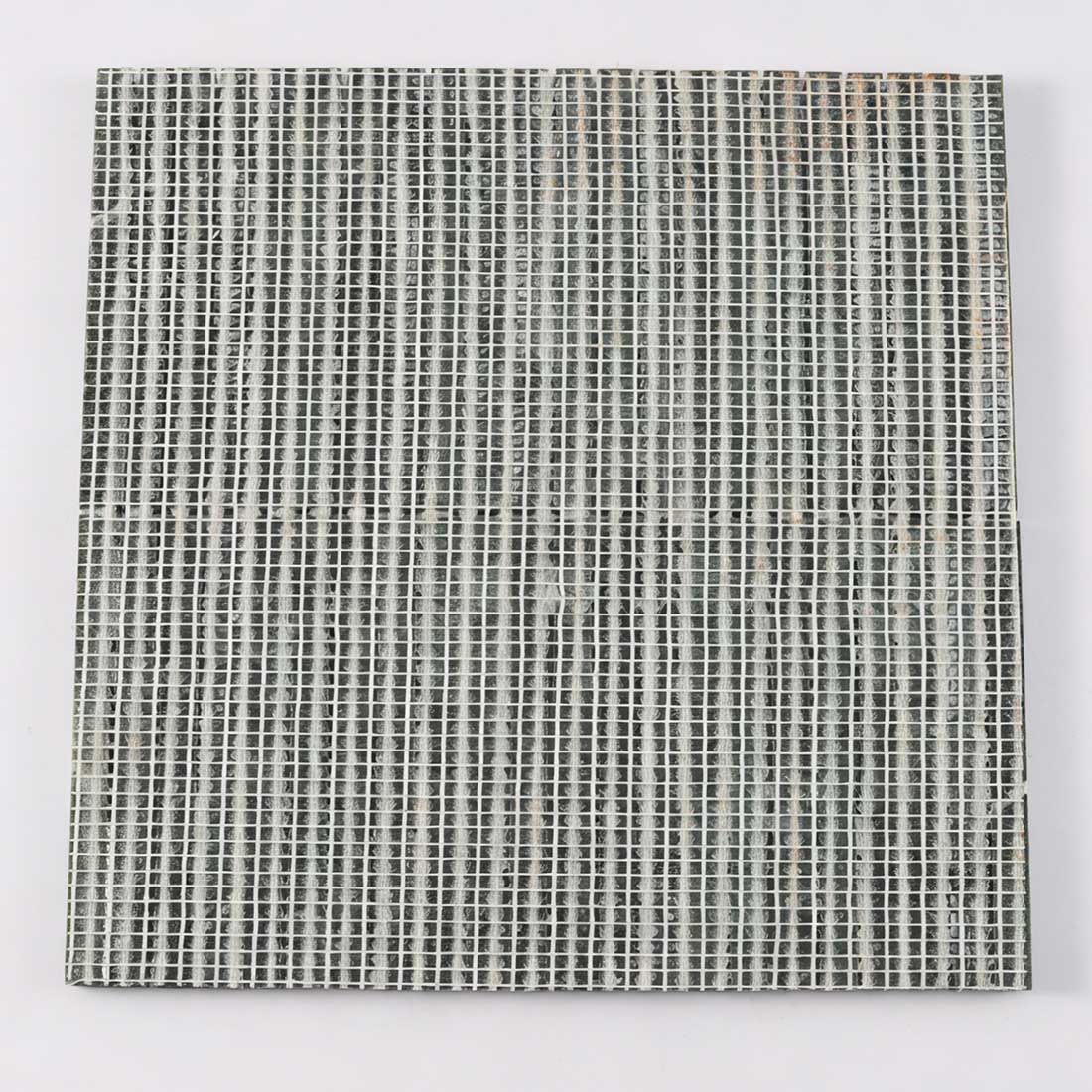 Professional mesh-mounted backing of green marble rod mosaic tile.
