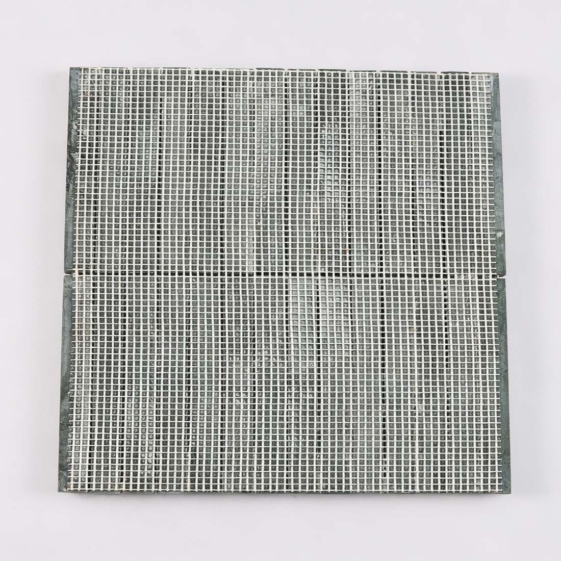 Mesh backing view of green marble rounded reed mosaic tile sheet