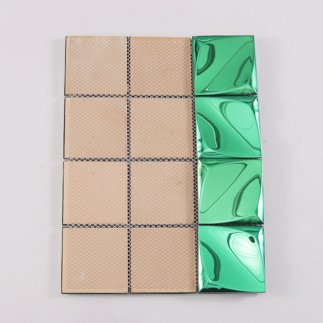 Green square metal tile sheet showing front raised chips and mesh backing