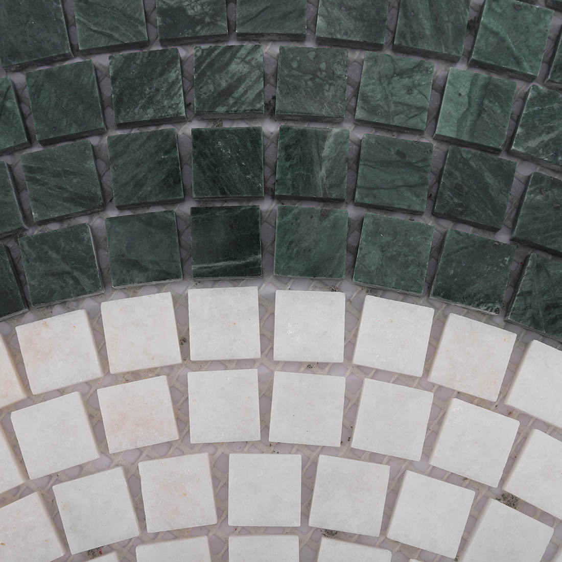 Close-up of green white fish scale pattern marble mosaic tile