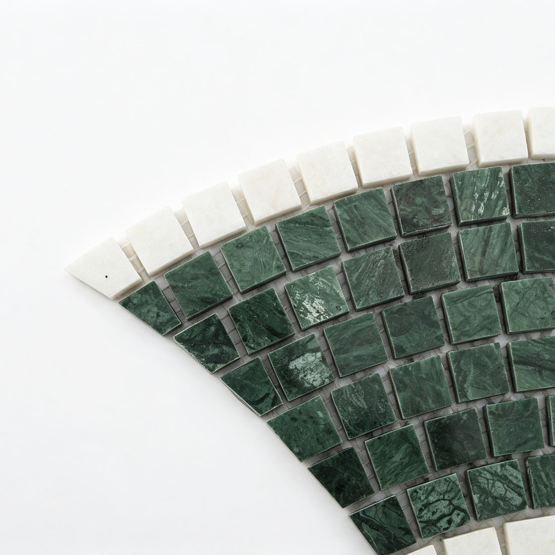 Edge detail of green white fish scale pattern marble mosaic tile