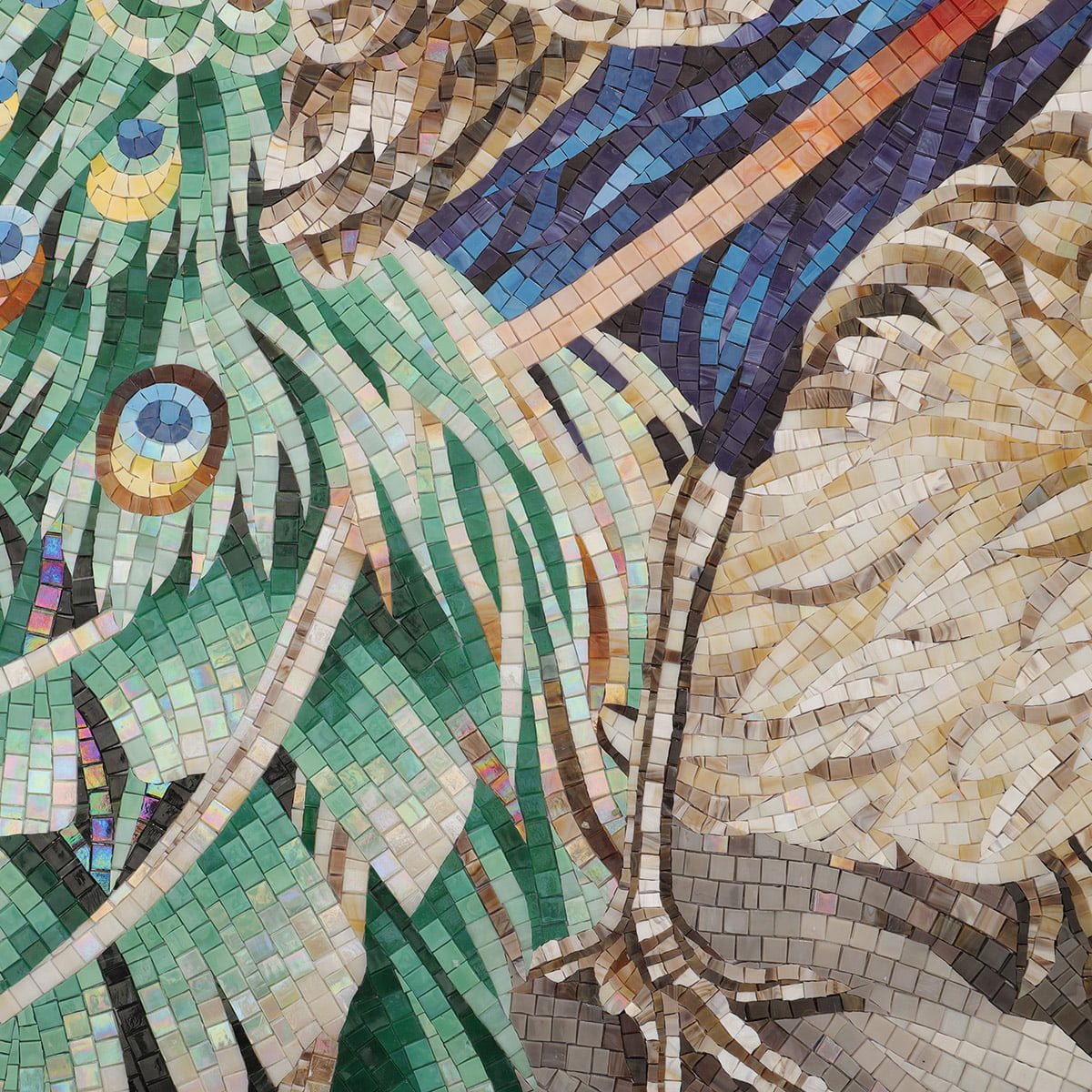 Handcrafted mosaic detail showing peacock feathers and vibrant blue body tiles