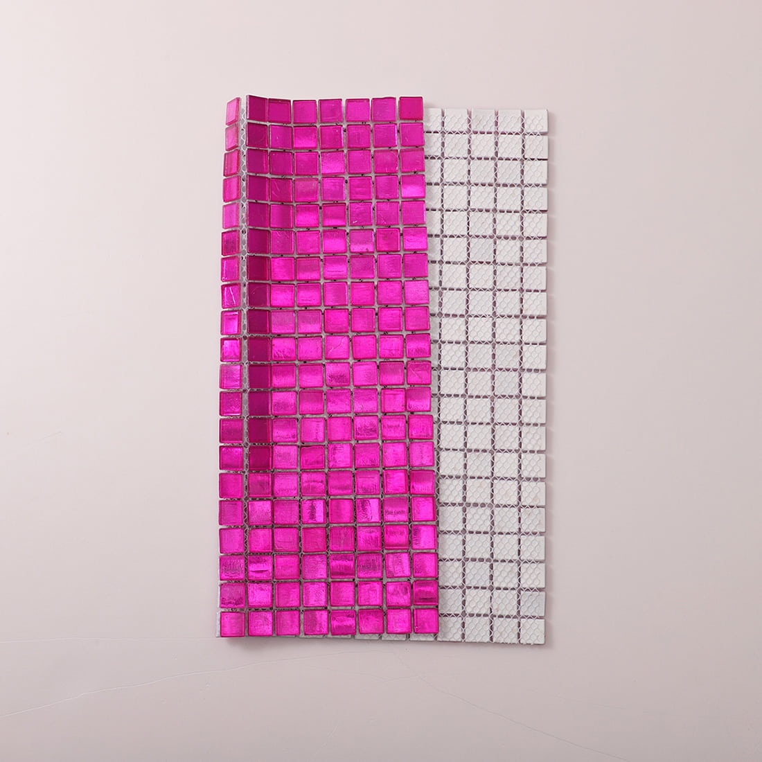 Mesh backing view of hot pink foil-backed glass mosaic tile sheet