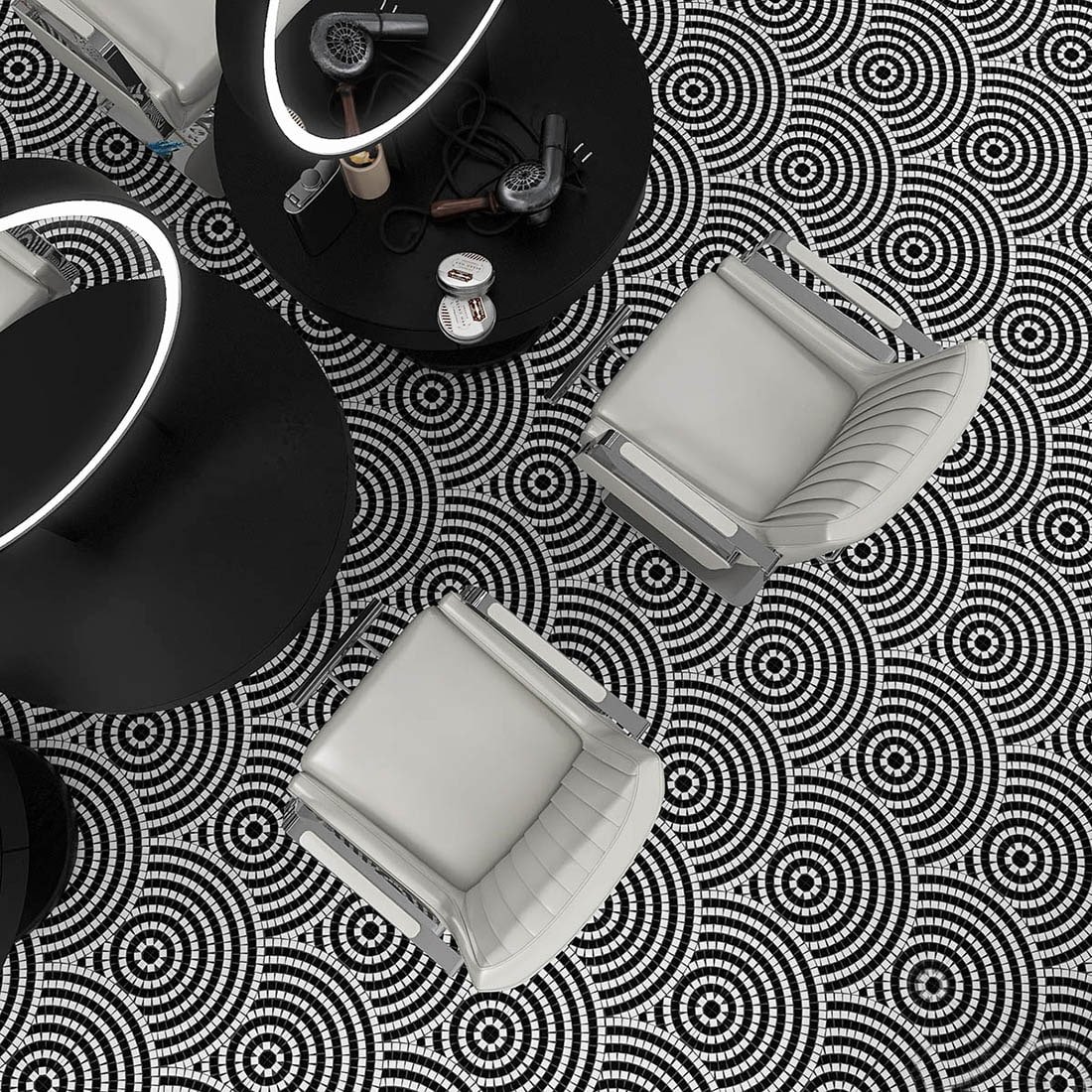 Modern interior with black and white fan pattern glass mosaic tile floor used in a salon or lounge space