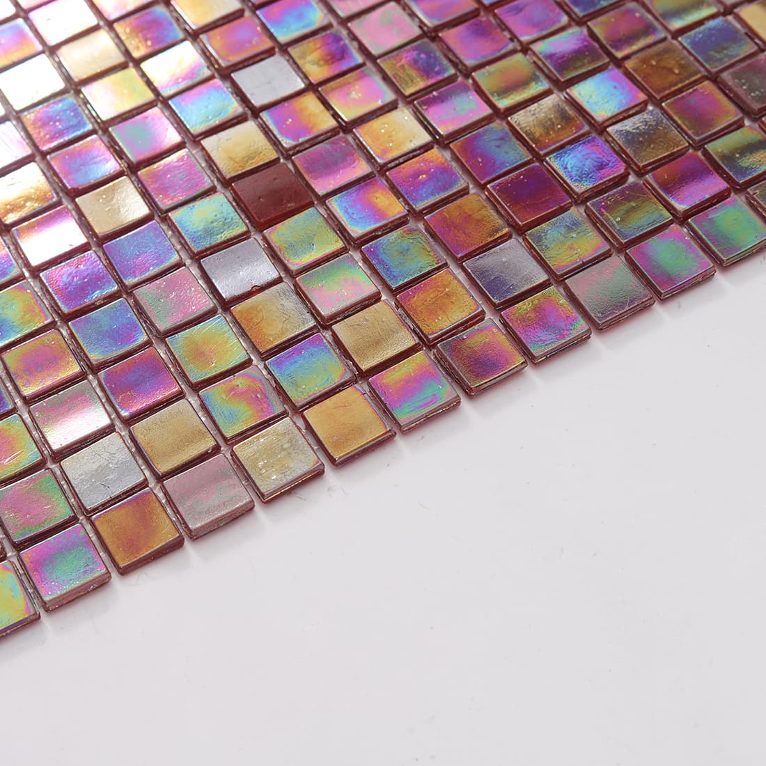 Edge view of iridescent merlot red square glass mosaic tile sheet