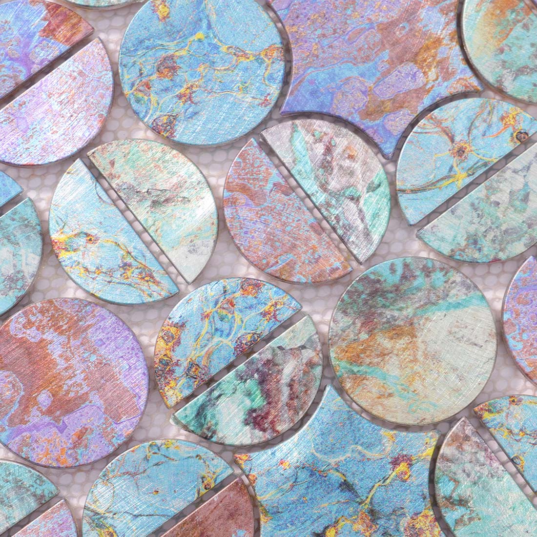 High angle surface texture shot of colorful iridescent aluminum tiles