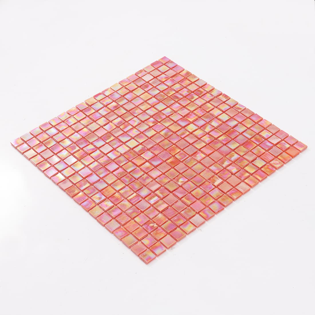 Angled view of iridescent orange square glass mosaic tile sheet