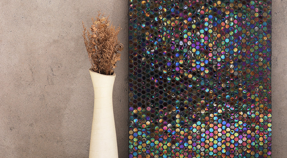 {"default":"Iridescent Mother of Pearl Penny Round Mosaic Wall, with a cream vase of dried flowers."}
