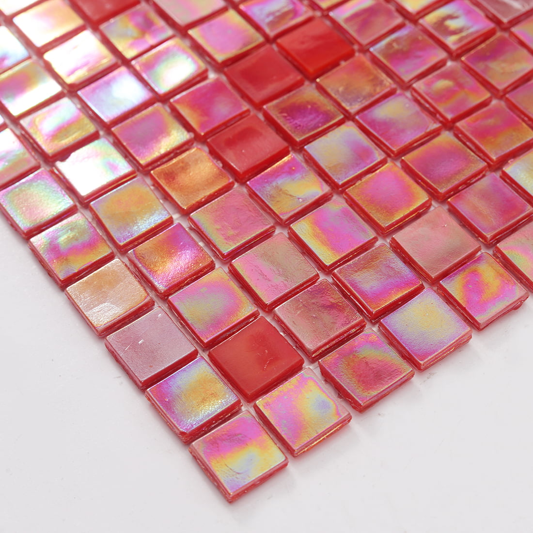 Edge view of iridescent red square glass mosaic tile sheet
