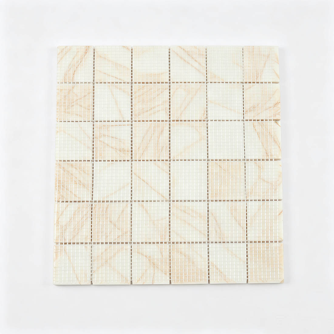 Rear mesh view of ivory square mosaic tiles with amber veins