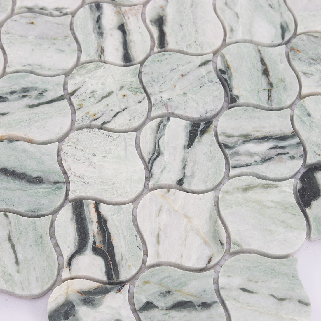 Texture detail of light green lantern marble mosaic tile with natural stone veins