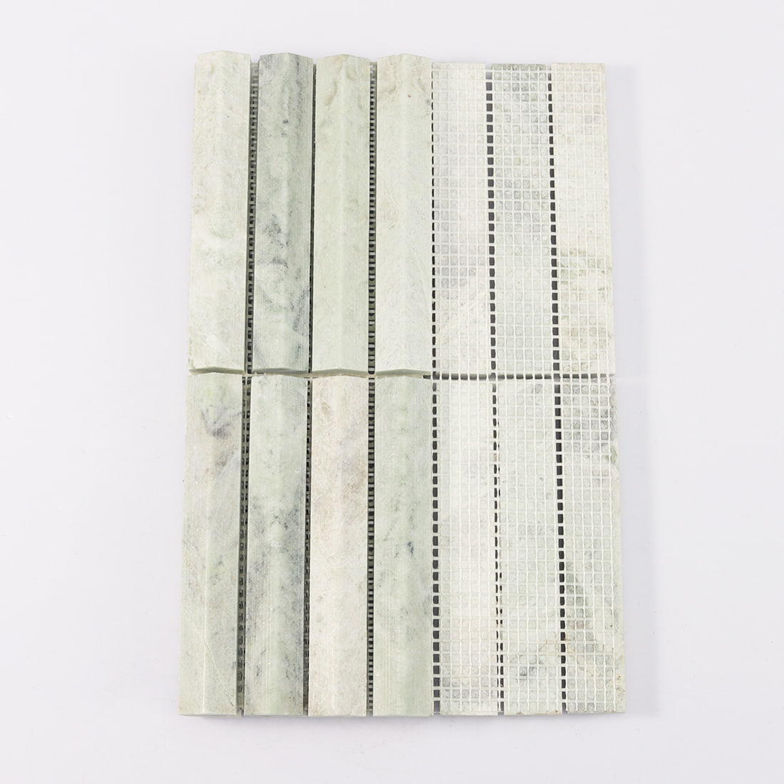 Back view of light green marble fluted mosaic tile with mesh backing