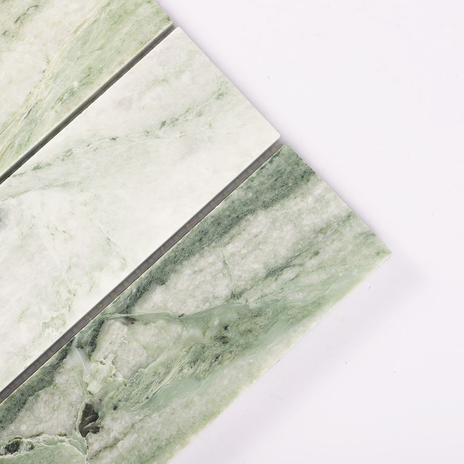 Corner detail of light green marble straight stack mosaic tile